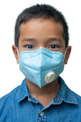 Asian boy wears a protective mask. (COVID-19)