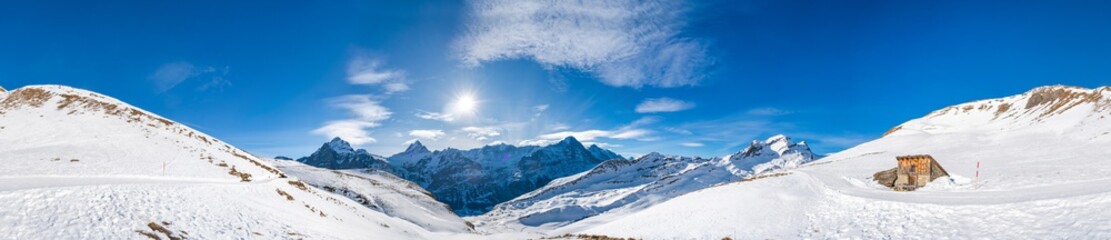 360 degree wide parnoramic view of snow covered Swiss Alps from First mountain in Grindelwald ski resort, Switzerland