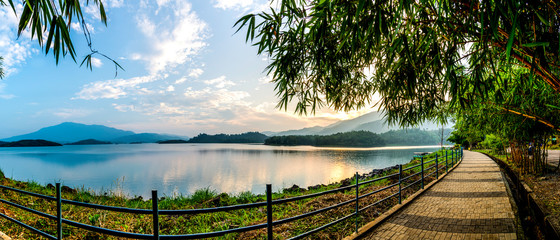 Beautiful Nature Panorama View from Kerala Calm Lake with colorful mountains during sunset, Tourism and Travel concept image