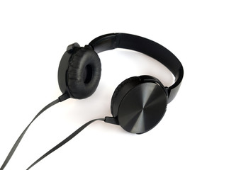Fototapeta na wymiar Black dynamic stereophonic headphones studio photo isolated on white background close up