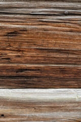 Texture od wooden planks. Wall made of antique wood. Raw wood after century.