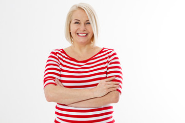 Pretty smiling middle-age lady posing over white background