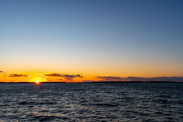 Sunset over Water, sun on left