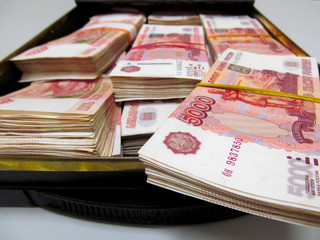 Russian money close-up. Set of banknotes of five thousand Russian rubles. Currency as financial concept. Black box for cell in depository storage. 