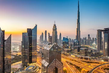 Foto auf Acrylglas Burj Khalifa Sonnenaufgang über der Skyline von Dubai Downtown