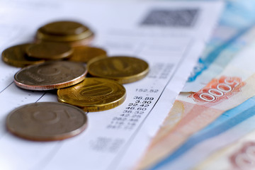 Cash bills and coins. Concept of financial technologies. Selective focus. Close up. For design.