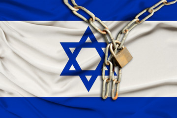 iron chain and castle on israel silk national flag with beautiful folds, the concept of a ban on...