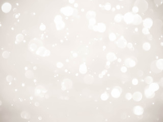 Abstract bokeh lights with soft light background .