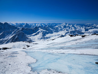 Fototapeta na wymiar Beauty of Nature - View from the top of Mount Elbrus. 4200m above sea level.