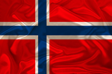 Fototapeta premium photo of the national flag of Norway on a luxurious texture of satin, silk with waves, folds and highlights, close-up, copy space, travel concept, economy and state policy, illustration