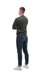 Fototapeta premium side view. serious young man looking at blank white screen .