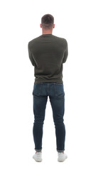 rear view. a young looking male standing in front of a blank white screen