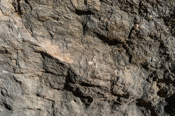 A close-up shot of the cliff texture of the low Alps mountains