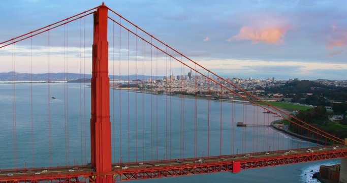  Aerial view of the Golden Gate Bridge. San Francisco, US. With the city skyline in the background. This suspension bridge is one of the most iconic landmarks of California. Shot on Red 8K.