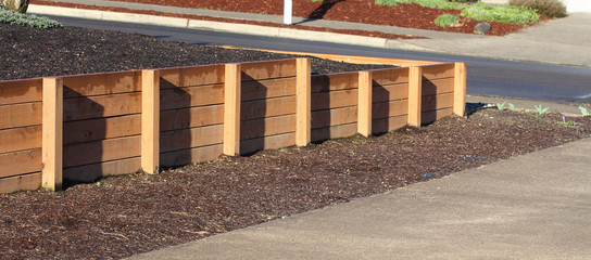 Wooden low retaining wall, cedar, posts, horizontal