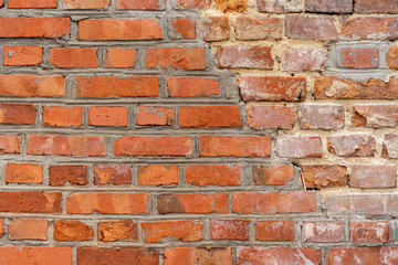 Texture of old red brick wall.