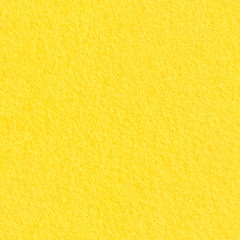 Light yellow felt material texture. Bright seamless background