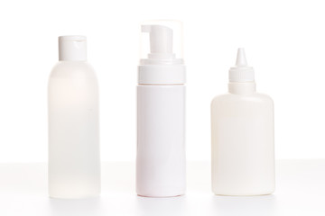 Cleaning product plastic white container for house clean on white table and isolated. household...
