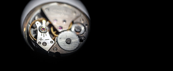 Watch mechanism with black background, mechanical and automatic movement, rubins and jewlellery,...