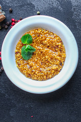mustard cereal sauce (French or Dijon recipe) menu concept. background. top view. copy space