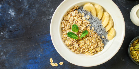 healthy food smoothie bowl, oatmeal, chia seeds and berries (breakfast dish or healthy snack) menu keto or paleo concept. background. top view. copy space