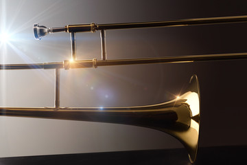 Trombone concert concept on a dark background with lights