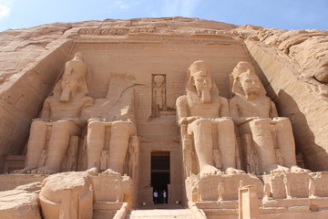 The great entrance of Abou Simbel temple in Egypt with huge statues in the doorway