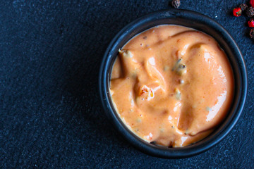 sauce tomato in a sauceboat (fresh serving) menu concept background. top view. copy space