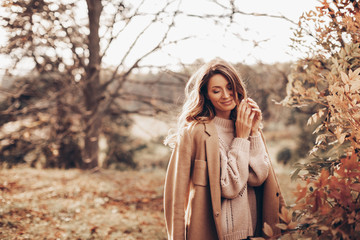 Beautiful girl in autumn park    