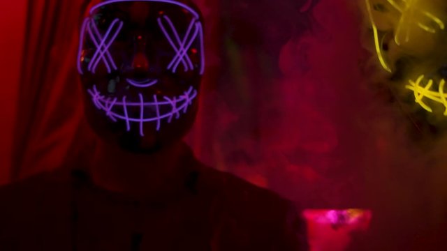 guys in scary glowing masks.