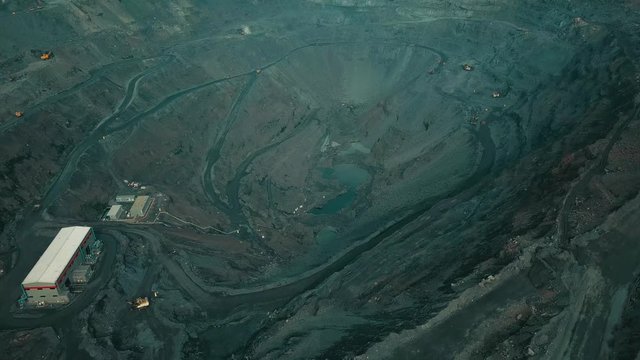 Aerial view of the Iron ore mining, Panorama of an open-cast mine extracting iron ore, preparing for blasting in a quarry mining iron ore, Explosive works on open pit