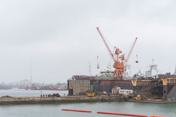 Fototapeta premium Active machinery, cranes working in the port of Mar del Plata, Argentina