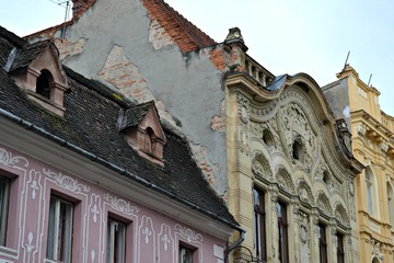  Brasov, Romania, richly decorated facade of a historic building in old town 