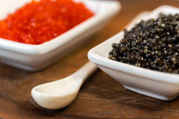 Black sturgeon and red salmon caviar close up