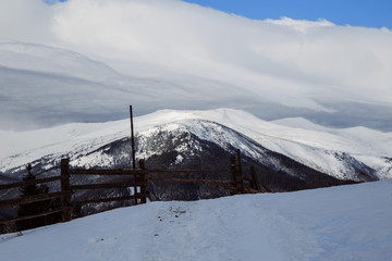 Winter in the mountain village Dzembronya with Chornohora ridge !