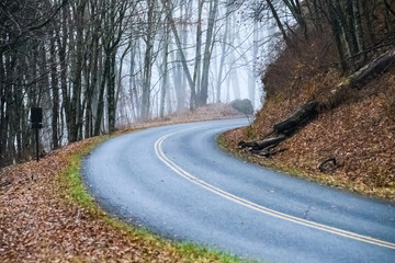 Fototapeta premium Roadway Meandering Through a Foggy Appalachian Morning Along the Blue Ridge Parkway