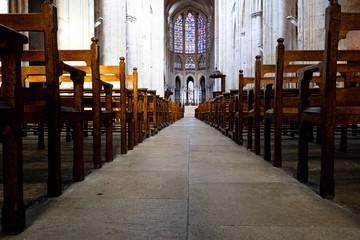 Fototapeta na wymiar Tours, France - 02/20/20 :Tours's cathedral. Cathedral Saint Gatien'interior. Inside the cathedral. Evening picture. Religious pathway.