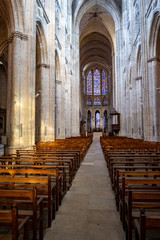 Fototapeta na wymiar Tours, France - 02/20/20 :Tours's cathedral. Cathedral Saint Gatien'interior. Inside the cathedral. Evening picture. Religious pathway.