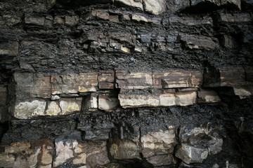 Black rock texture in the Carpathian mountains