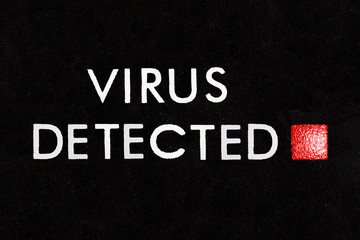 Macro photograph of virus detected indicator light. 