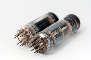 Old radio tubes on white background