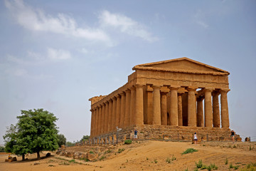 Fototapeta na wymiar The Temple of Concordia, a 5th-century BC, Doric-style Ancient Greek temple in the Valley of the Temples, a UNESCO World Heritage Site in Agrigento, Sicily, Italy .