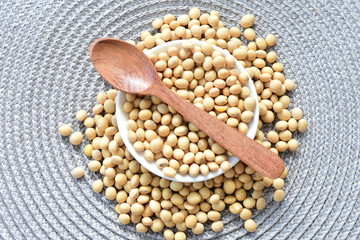Raw soybeans (Glycine max) displayed in containers