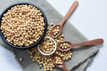 Raw soybeans (Glycine max) displayed in containers