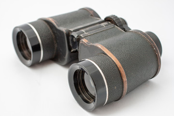 Old binocular isolated on white background
