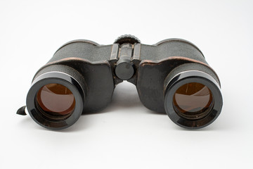 Old binocular isolated on white background