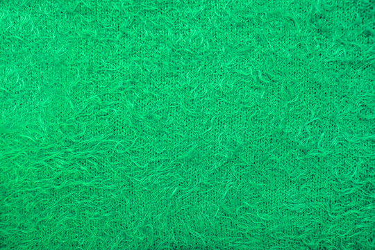 The Texture Of The Green Wool Fabric. Can Be Used As Background