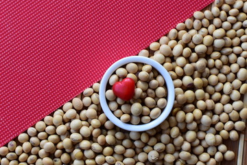 Raw soybeans (Glycine max) displayed in containers