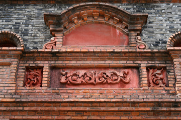 A close-up of the exquisite decoration of the outer wall of the old Shikumen building in Shanghai, China