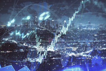 Financial graph on night city scape with tall buildings background multi exposure. Analysis concept.